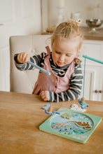 Load image into Gallery viewer, Little girl playing the magnetic lake dipping game 
